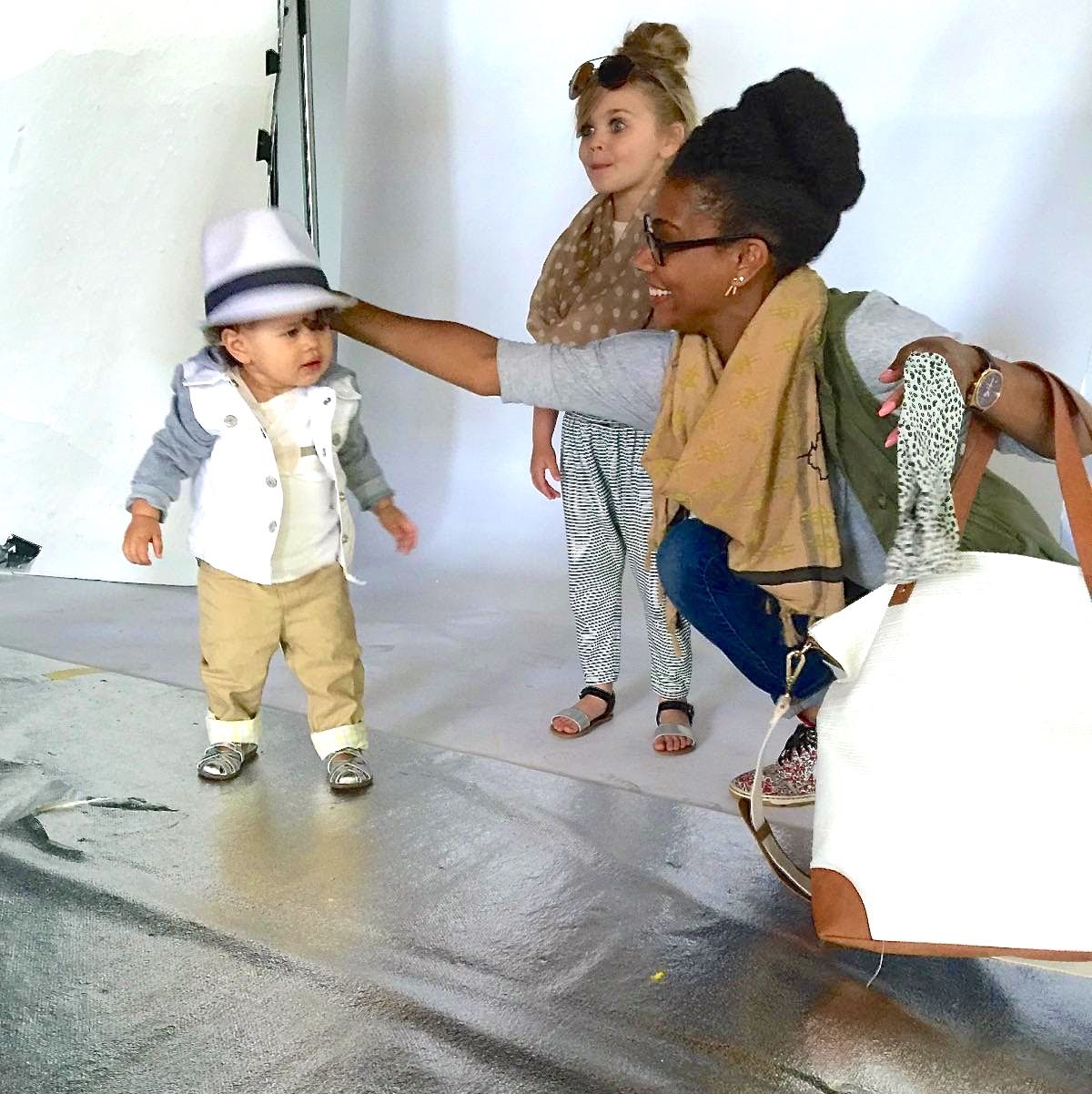 Dressing our mini models on set. They were so cute!